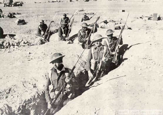 [This squad from the Royal Sussex Battalion is passing through a communications trench in the Omars.]