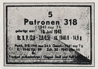 [Figure 93. Label for 5 rounds of armor-piercing bullet (Patronen 318). (This label consists of two triangles, one red and the other yellow; the border and the printing are black; the edging is white.)]