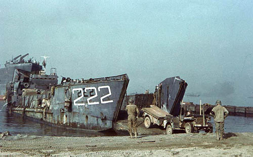 U.S. troops and equipment land at Salerno, Italy in September 1943