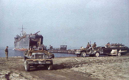 U.S. troops and equipment land at Salerno, Italy in September 1943